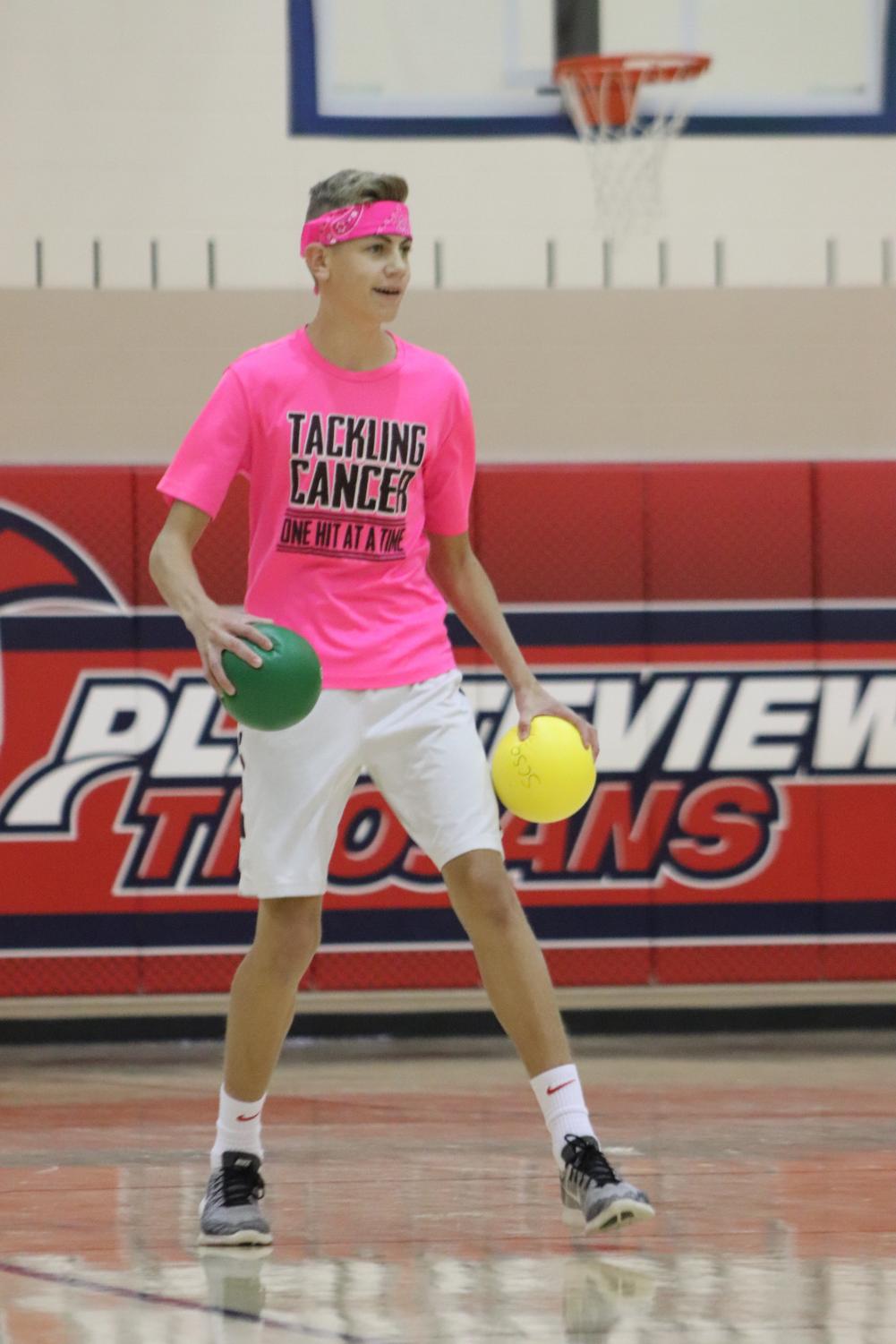Sophomore Tyler Riley stayed light on his feet as he blocked and dodged fast-paced balls flying past him.
