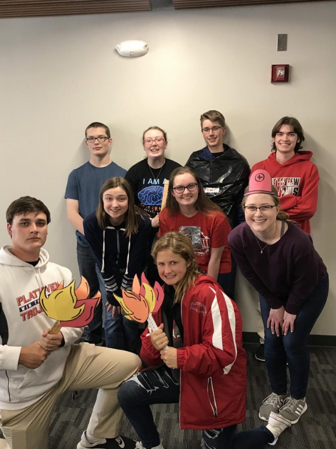 Nate Seeber (9), Emma Mathias (10), Clayton Lutz (9), Louden Ferguson (12), Claire Snodgrass (10), Ella Ferguson (9), Elise Lutz (12), Jace Mahoney (11), and Sophie Johnson (11) posed for a group photo after they finished presenting. 