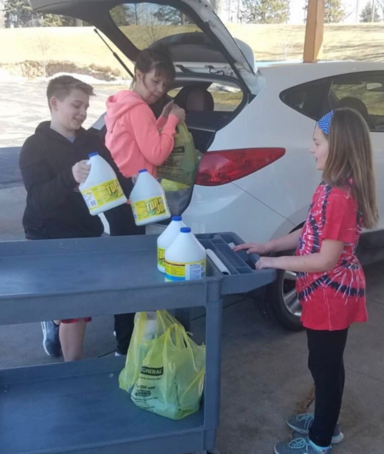 Westmont kids helped load supplies into cars so their families could transport it to those in need. 
