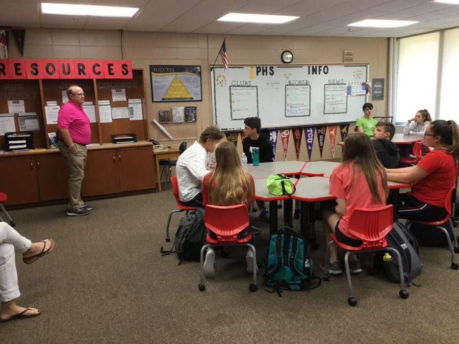 Mr. Jennings explains the resources that are available at the College/Career Center to Mrs. Falch’s attentive advisory students.
