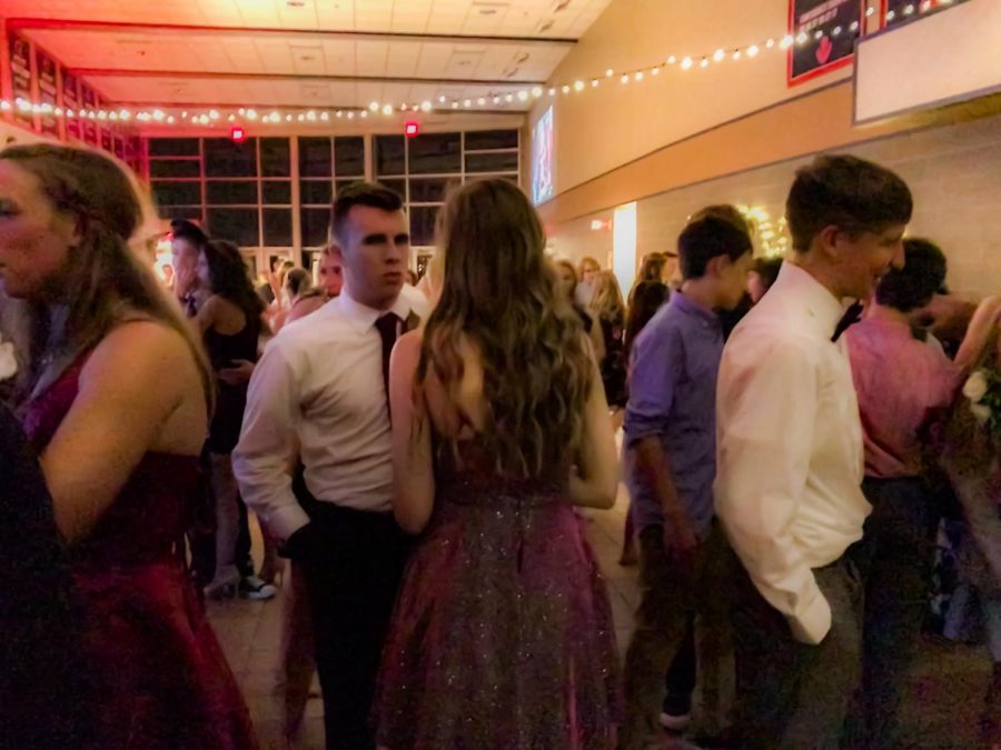 Senior Noah Vanderzwaag converses with his date at the 2019-2020 Homecoming Dance on Saturday, September 14.