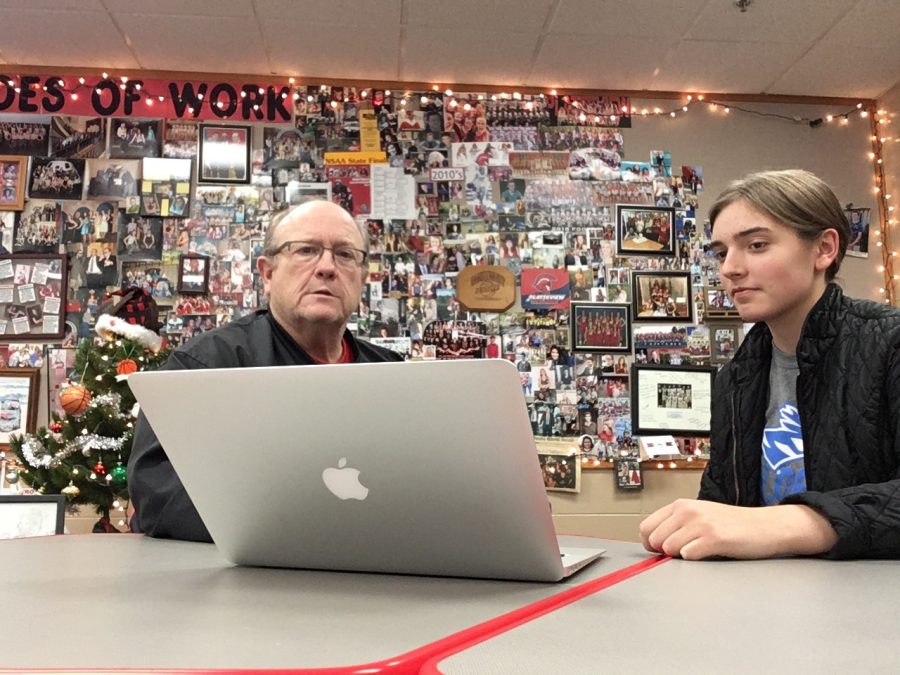 Sylvia Dierking (12) talked with Mr. Jennings as they looked at information on Mr. Jennings’s computer on December 6th. Dierking currently interns with two teachers in Platteview’s Math Department. She is one of more than 20 students whom Mr. Jennings supervises through the internship program.