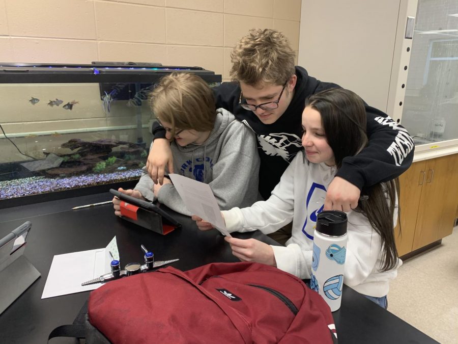 Junior Chloe Adams (right) studies with fellow juniors Dustin Benedict and Maverick Jensen. In this article, Adams shared what her favorite comfort food is.