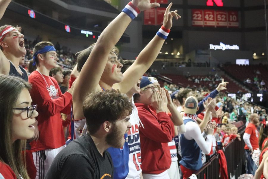 Senior Jace Mahoney cheers during the state volleyball tournament. Through Mahoney’s experience at Platteview, he said, “I have learned that [it] is okay to be interested in a lot. It’s okay to be in more than just sports. I also learned to be nice to every single person I interact with because of the community I’ve grown with.”