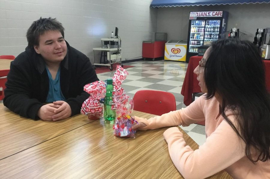 Freshmen Alexander Glynn and Eileen Ramirez discuss the Celebrate Safe valentine gifts during study hall. The gifts will be on sale during lunch if you would like to purchase one for your friend or significant other.