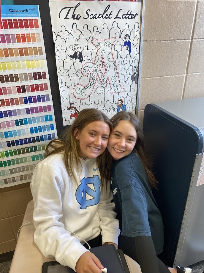 Anna Haubensak and Carsyn Loncke work on their Scarlet Letter projects in American Literature.