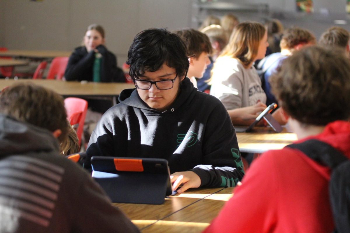 Christopher Redlightning (9) working hard during his study hall.