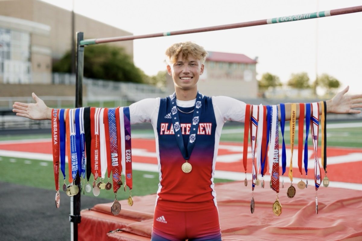 Arms Full of Medals: Tyler Daly (12) had a stellar senior year in Cross Country.
